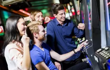 A Group Playing Arcade Games