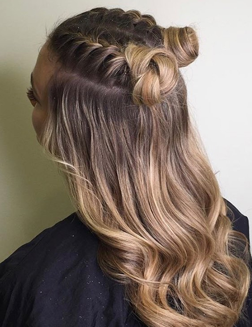Braided space buns with beachy waves