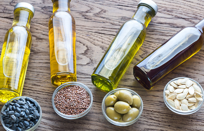 Bottles of olive oil vs. vegetable oil like flaxseed oil