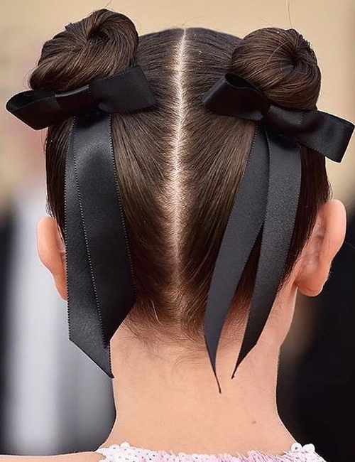 Elegant space buns with ribbons