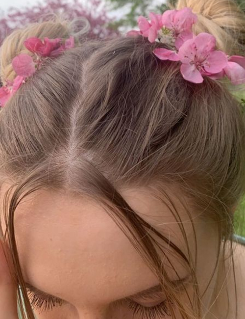 Elevated space buns with flowers