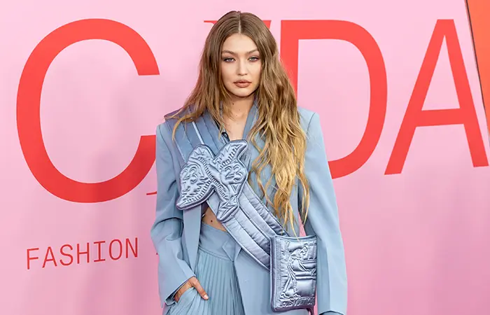 Gigi Hadid with beachy waves hairstyle for type 1c hair.