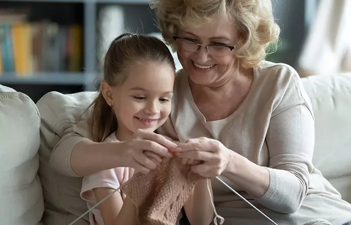 Grandmother teaching crochet