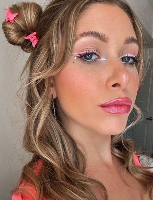 Half-up half-down space buns with cute accessories