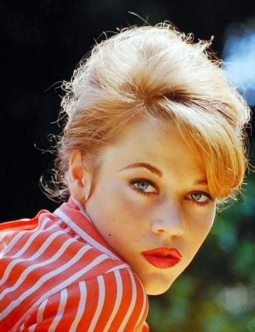 Jane Fonda in coral shirt and matching lips