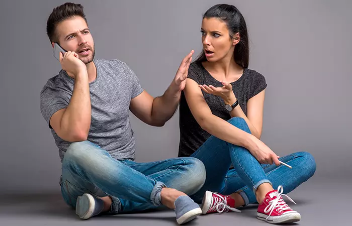 Man ignoring his girlfriend