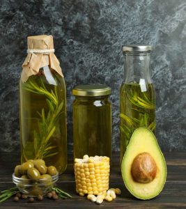 Bottles of olive oil vs. vegetable oils for cooking