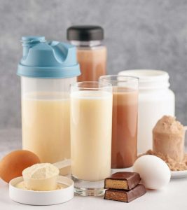 Different protein shakes kept on a table