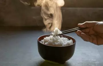 Sticking-Chopstick-In-Rice