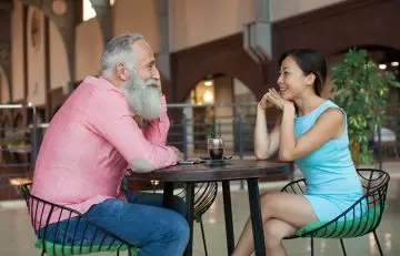 Older man and younger woman on a lunch date