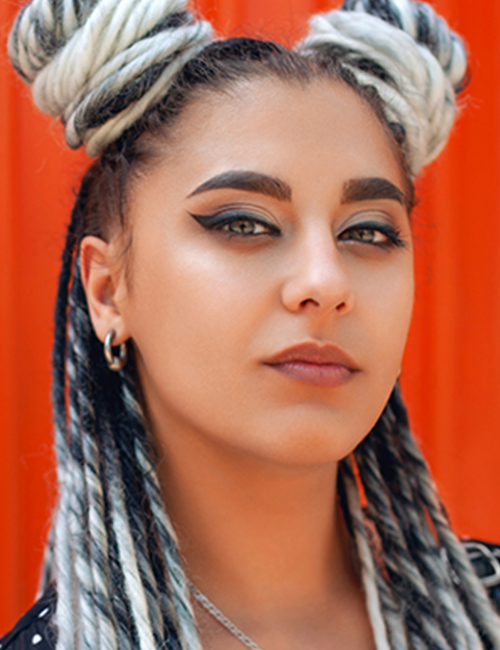 Twisted hair buns with ombre white dreadlocks