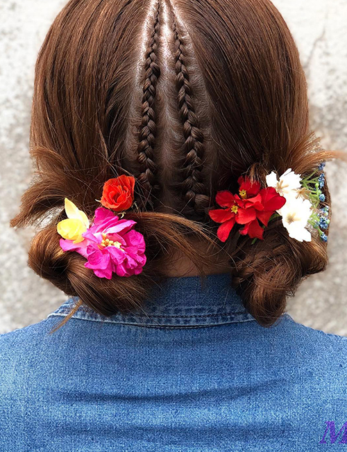 Undone space buns with colorful flowers