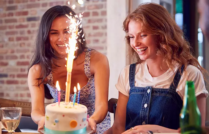 Woman celebrating sister-in-law’s birthday with family