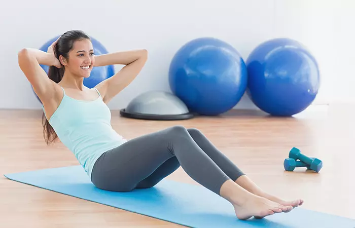 Woman doing sit-ups