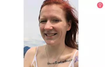 Woman with motivational quote tattoo on her collarbone as a mother son tattoo idea