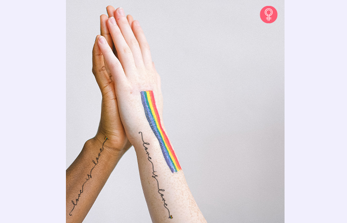 palm to palm hands with rainbow art and love is love mother son tattoo
