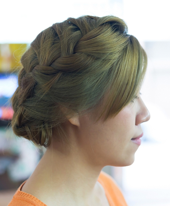 Braided updo with side bangs