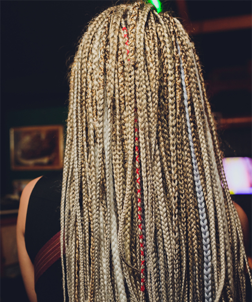 Colorful boho micro braids hairstyle