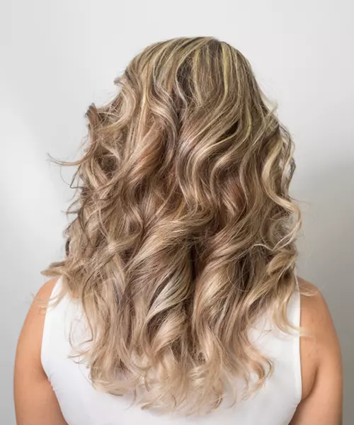 Golden blonde balayage highlights for brown hair