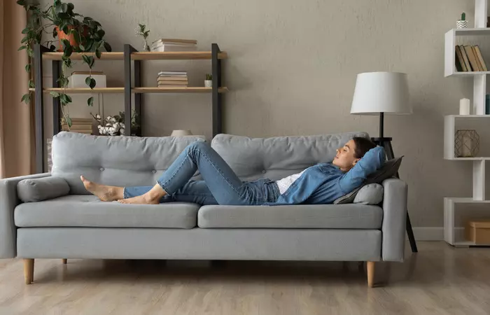 A woman relaxing on a couch