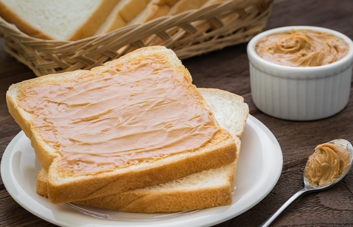 Bread slices with smooth peanut butter