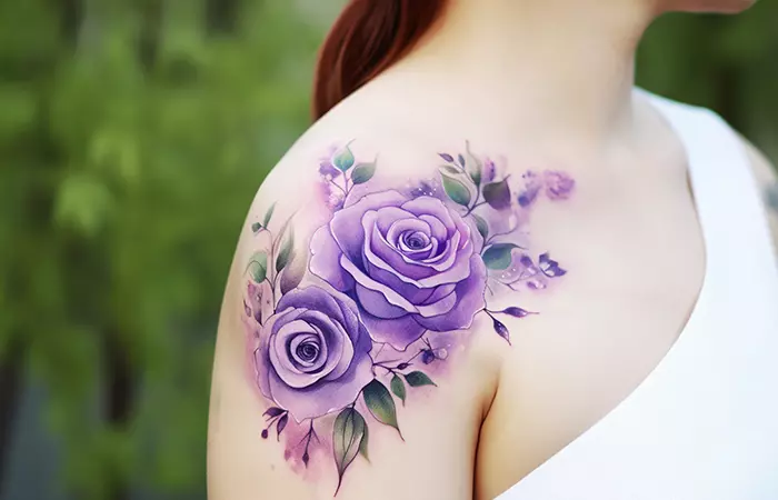 A manga-style purple rose tattoo on the shoulder