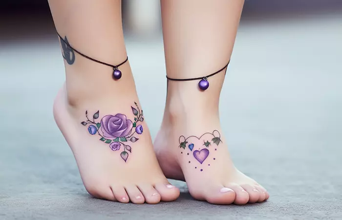 A purple and blue rose tattoo set on the feet