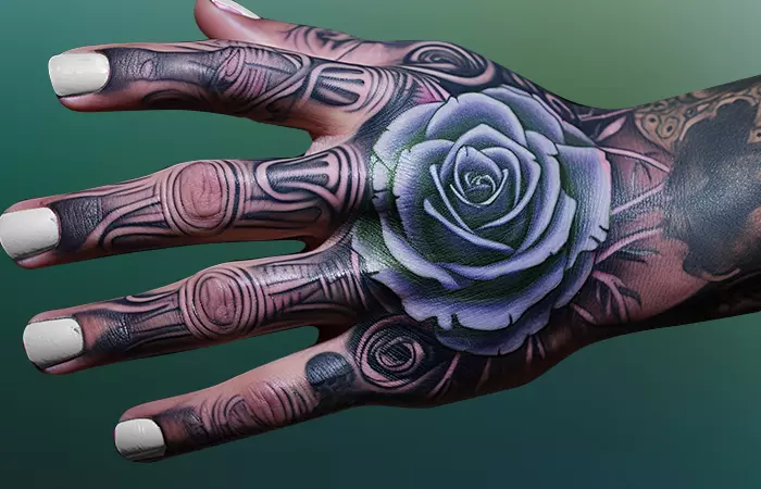 A skeletal hand tattoo with a pastel blue rose