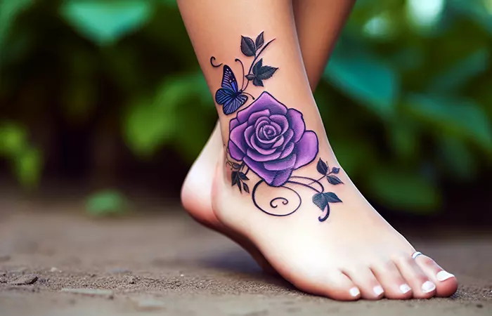 An illustrative butterfly and purple rose tattoo on the feet