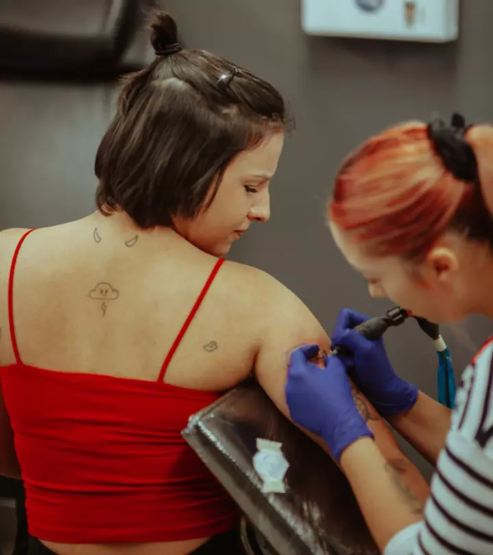 A woman getting a tattoo