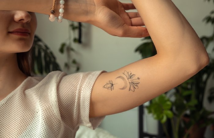 Little Tattoos — Minimalist coordinates on the left bicep. Tattoo... |  Petit tatouage, Petit tatouage homme, Tatouages coude