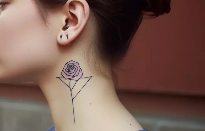 A minimal geometric rose neck tattoo below the neck
