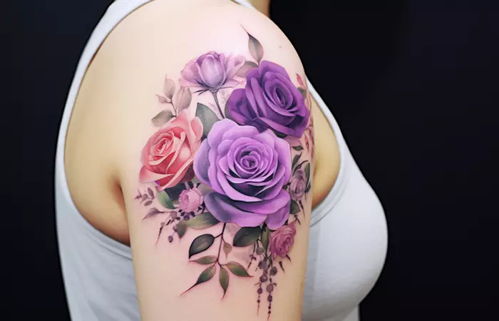 Pink and purple rose tattoo on shoulder