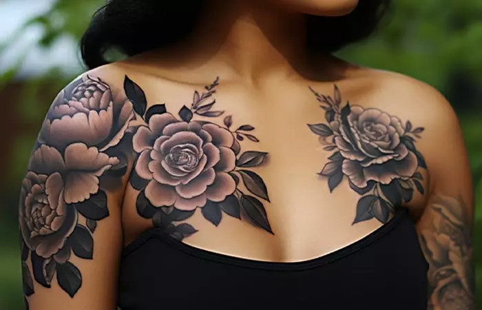 A realistic Japanese style black rose tattoo on the shoulder