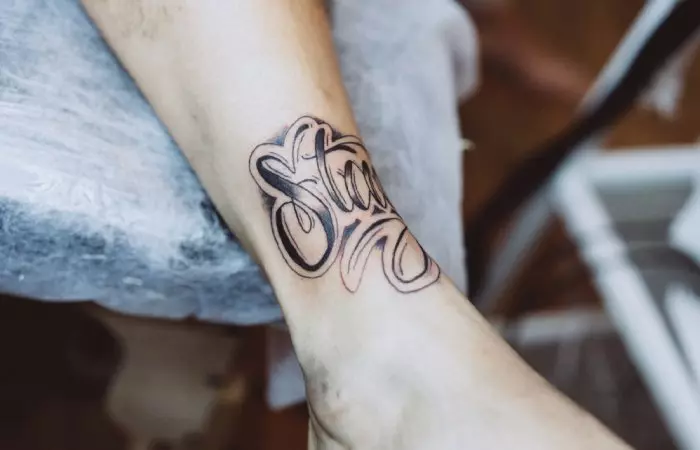 Tattoo at the front of the ankle