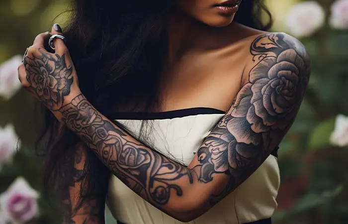 Dark art sleeve tattoo