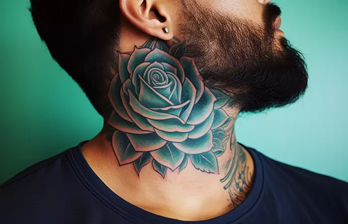 A rose neck tattoo in turquoise color
