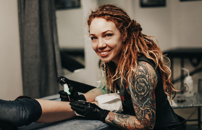 A tattoo artist at work