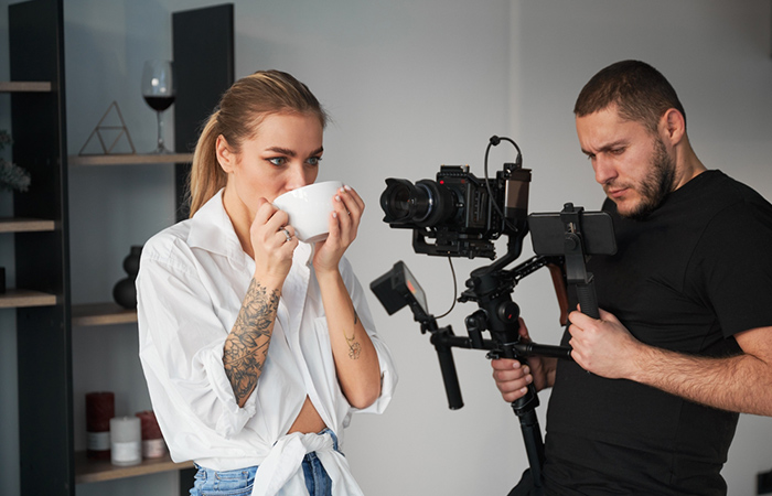 A tattooed model during a photoshoot