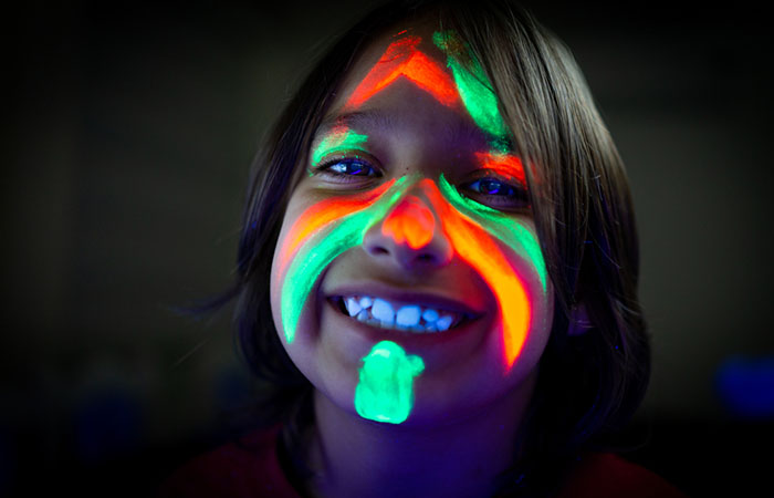 Little boy happy with his UV tattoo