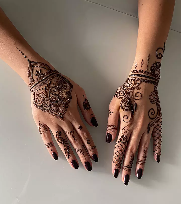 Henna tattoo on both hands of a woman