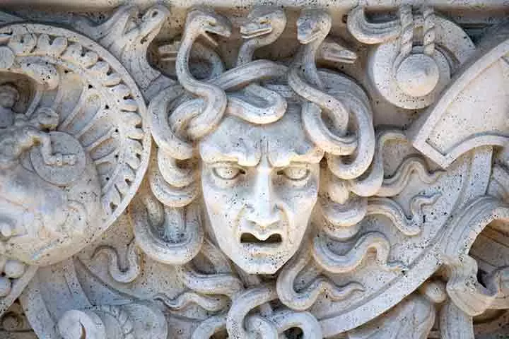 A stone panel depicting the story of medusa