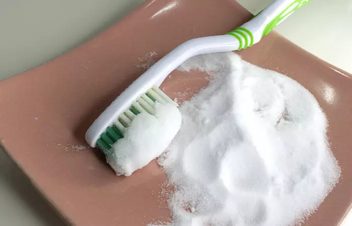 Toothpaste and baking soda for tattoo ink stain removal from clothes