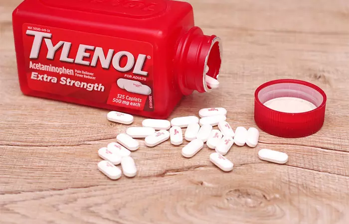 Tylenol tablets in a red bottle
