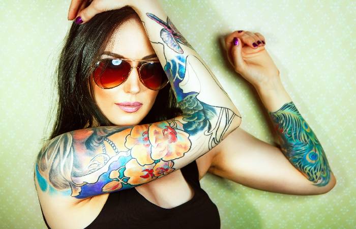 Woman with a shiny tattoo