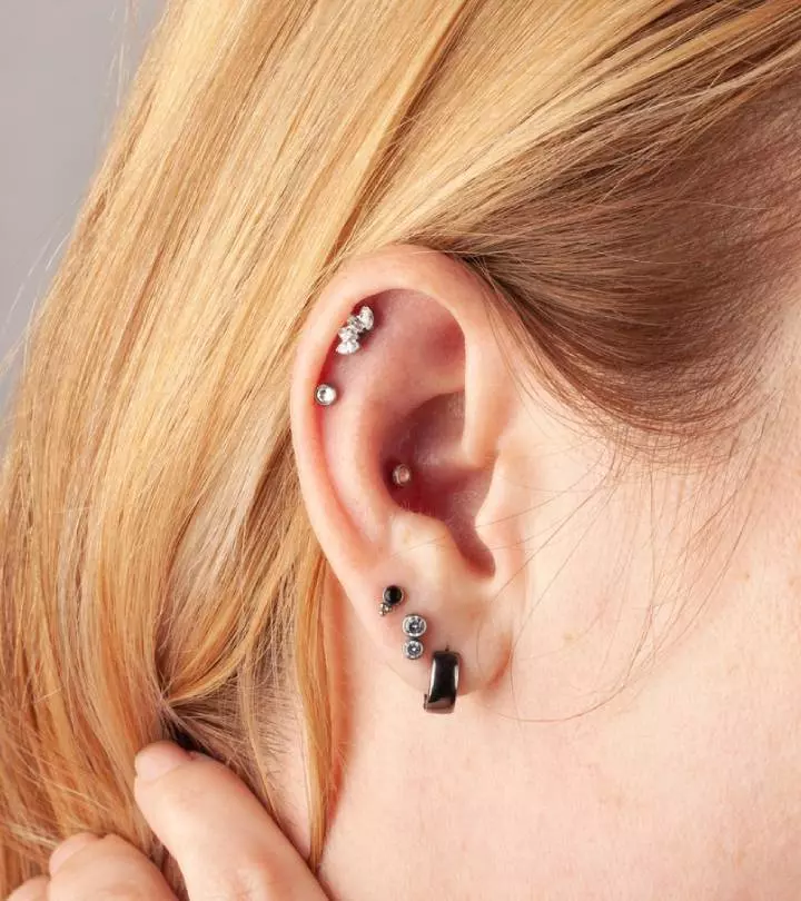 A girl with a double helix piercing