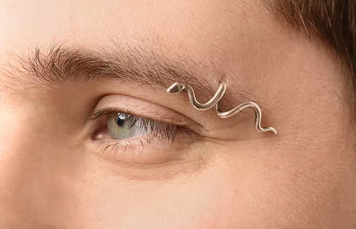 A twister spiral ring eyebrow piercing