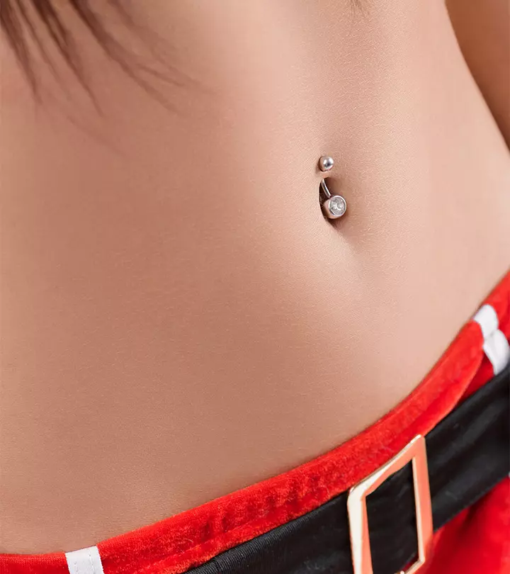 A woman with a belly button piercing