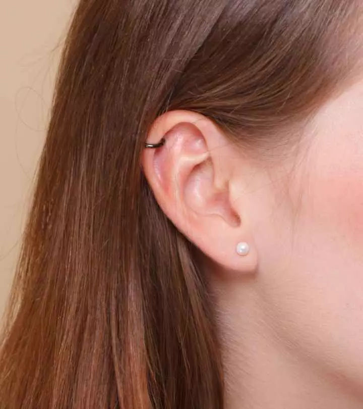 A woman with a helix ear piercing