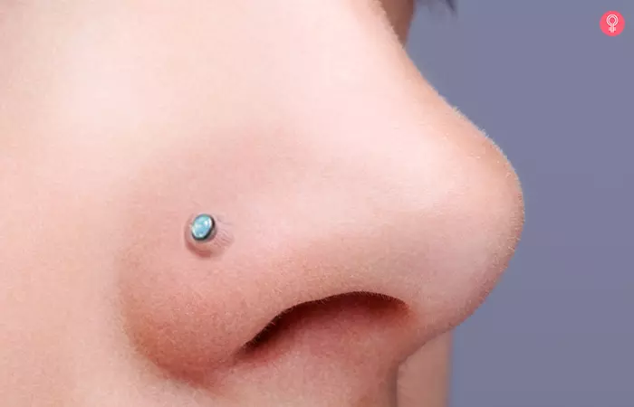 A woman with a bump on her nose piercing